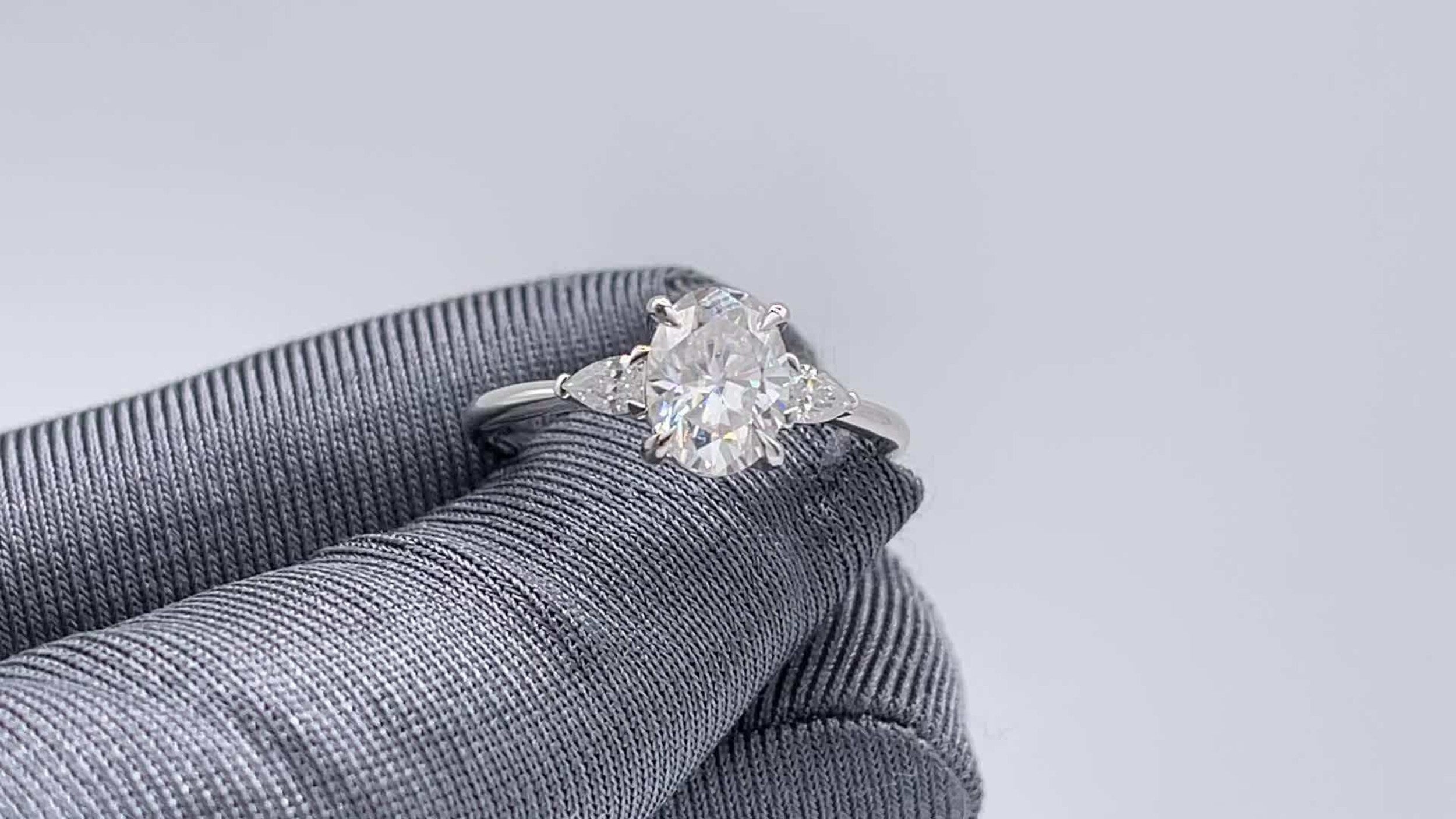 Three Stone Engagement Ring Featuring 2.78 CT Oval Moissanite 5