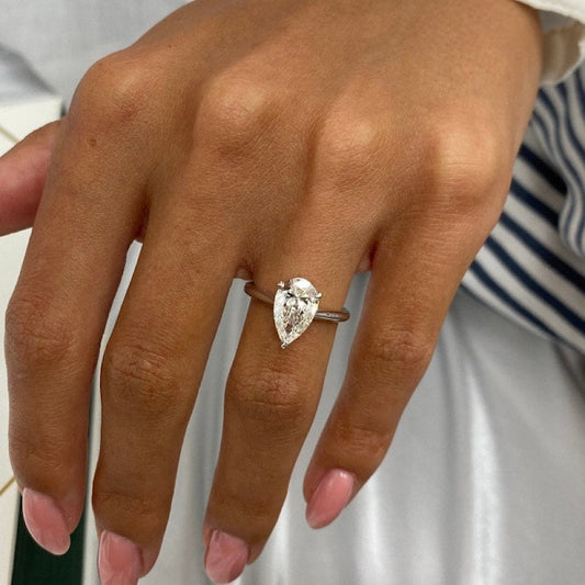 Solitaire Engagement Ring Featuring 1.75 CT Pear Moissanite 1