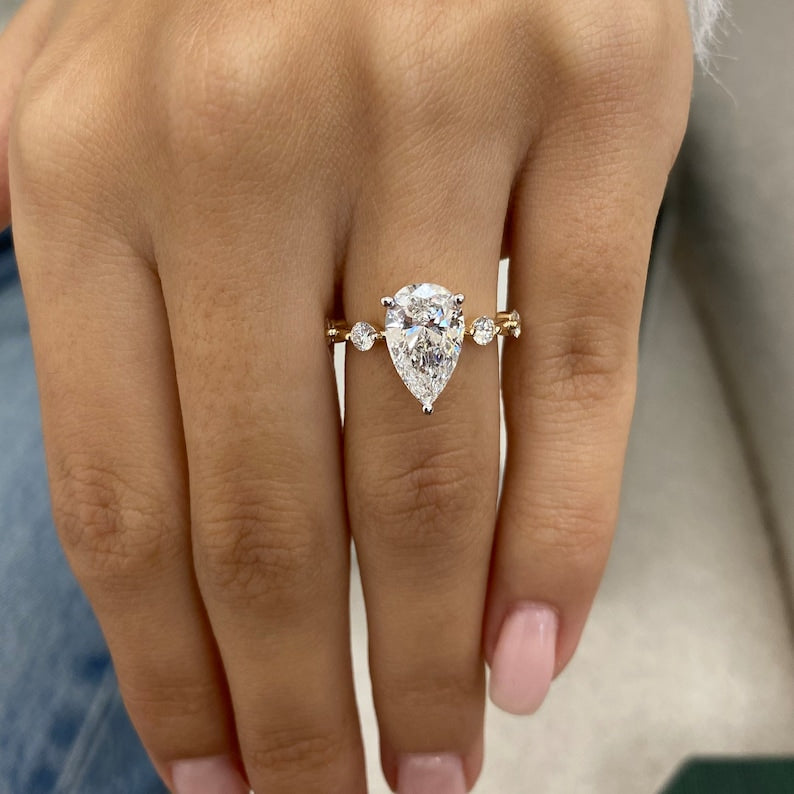 
                  
                    2.0 CT Pear Moissanite Dainty Two Tone Engagement Ring - farrellouise
                  
                