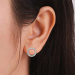 1.2 TCW Round Cut Moissanite Huggies Earrings