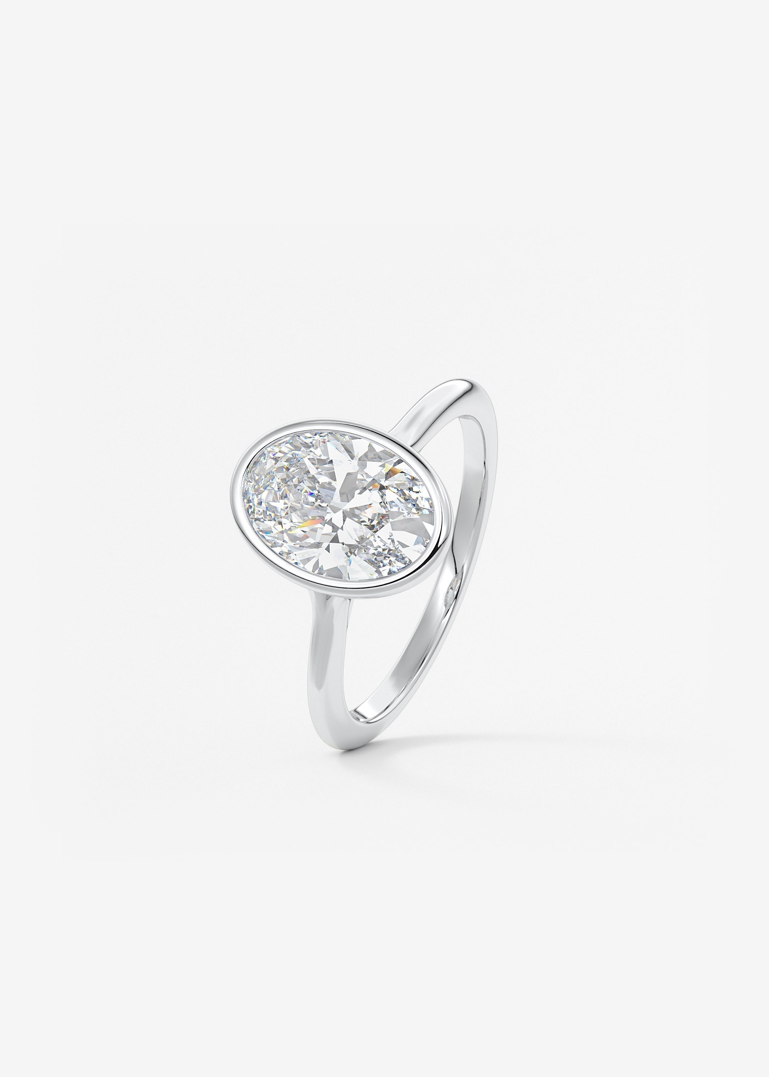 Oval Bezel/ Split Shank Lab Grown Diamond Engagement Ring
