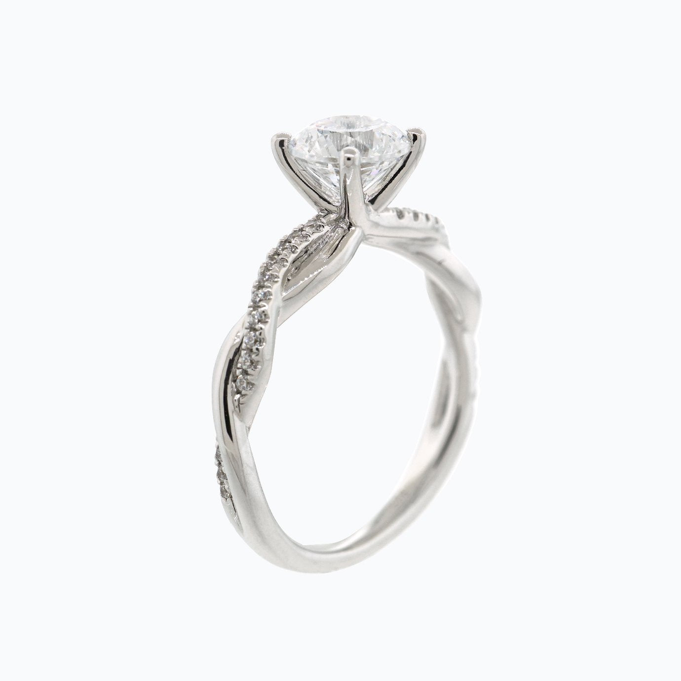 
                  
                    1.0 CT Round Shaped Moissanite Solitaire Twisted Engagement Ring
                  
                