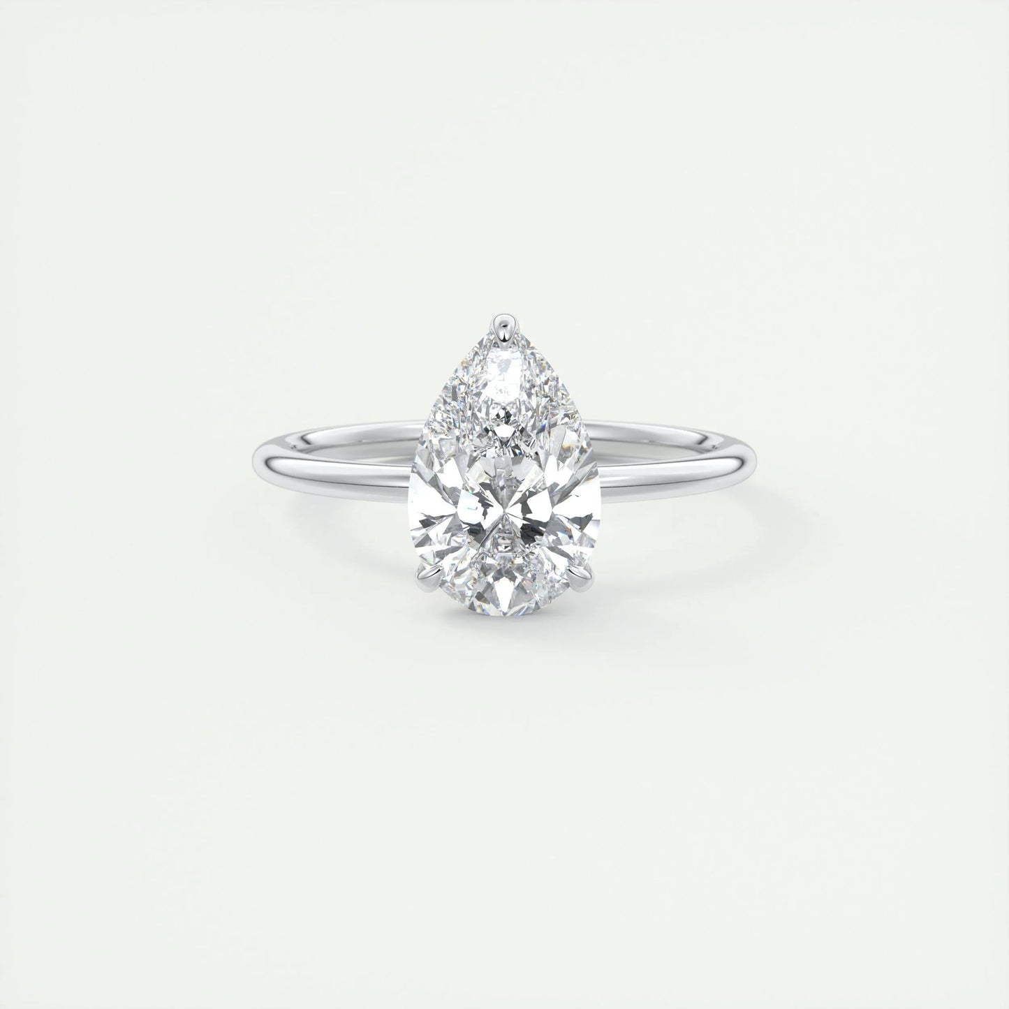 
                  
                    1.93 CT Pear Cut Solitaire Moissanite Engagement Ring 1
                  
                