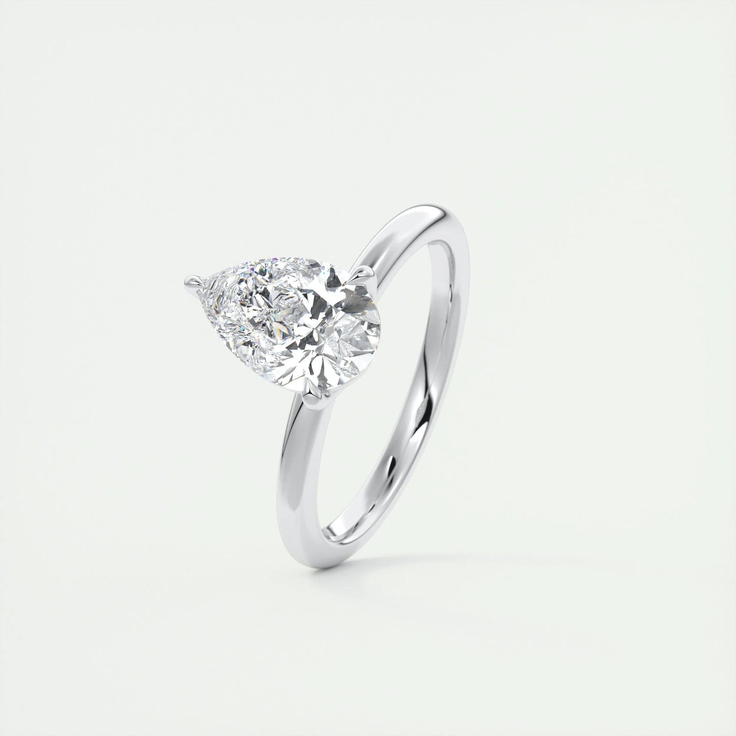 
                  
                    1.93 CT Pear Cut Solitaire Moissanite Engagement Ring 4
                  
                