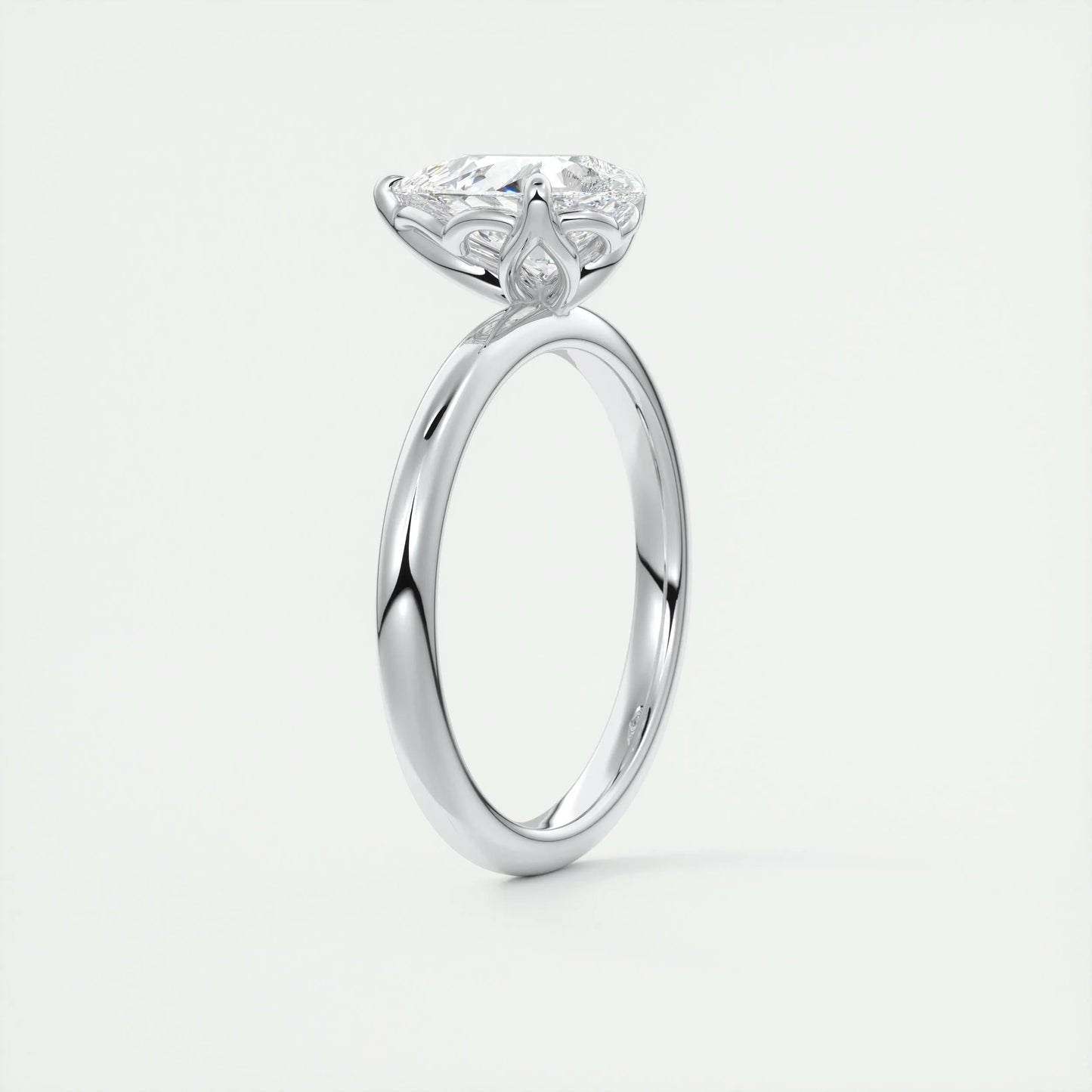 
                  
                    1.93 CT Pear Cut Solitaire Moissanite Engagement Ring
                  
                