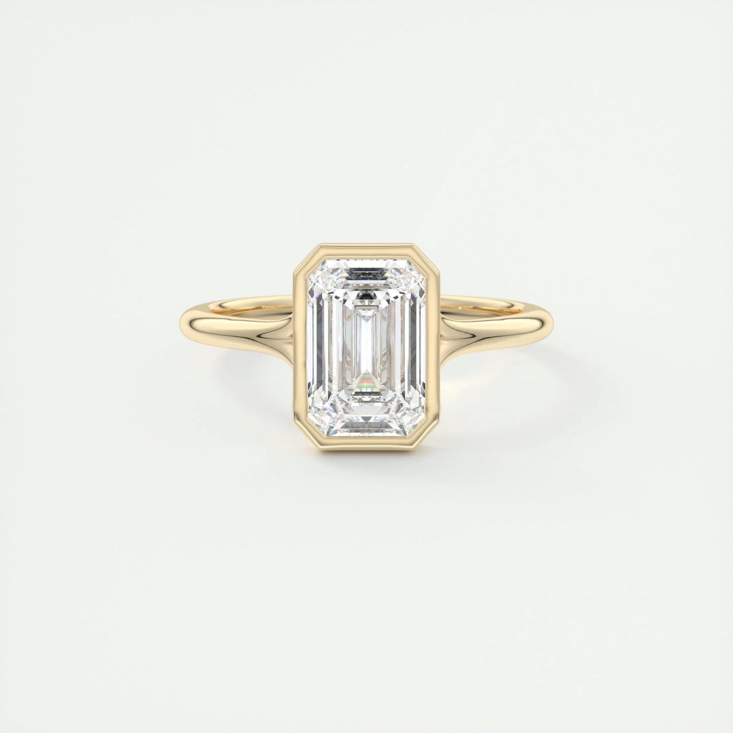 
                  
                    2.03 CT Emerald Cut Bezel Solitaire Moissanite Engagement Ring
                  
                
