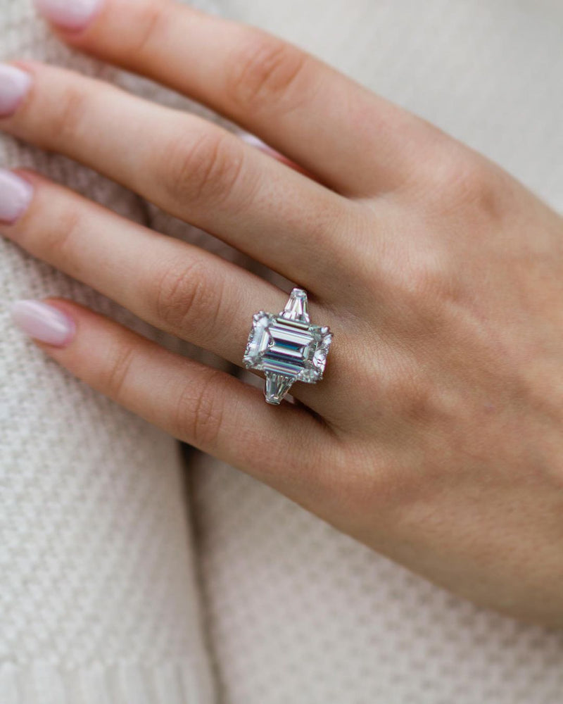 
                  
                    7.2 CT Emerald Cut Three Stone Moissanite Engagement Ring 6
                  
                