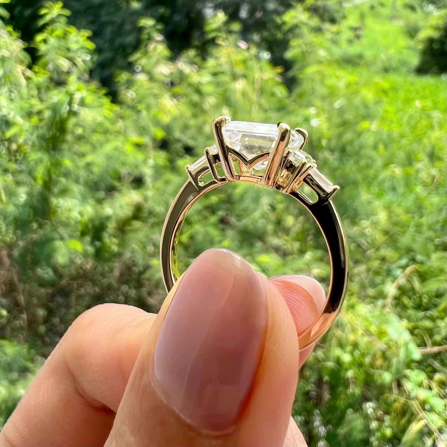 
                  
                    5.75 CT Emerald Cut 3 Stone Moissanite Engagement Ring 7
                  
                