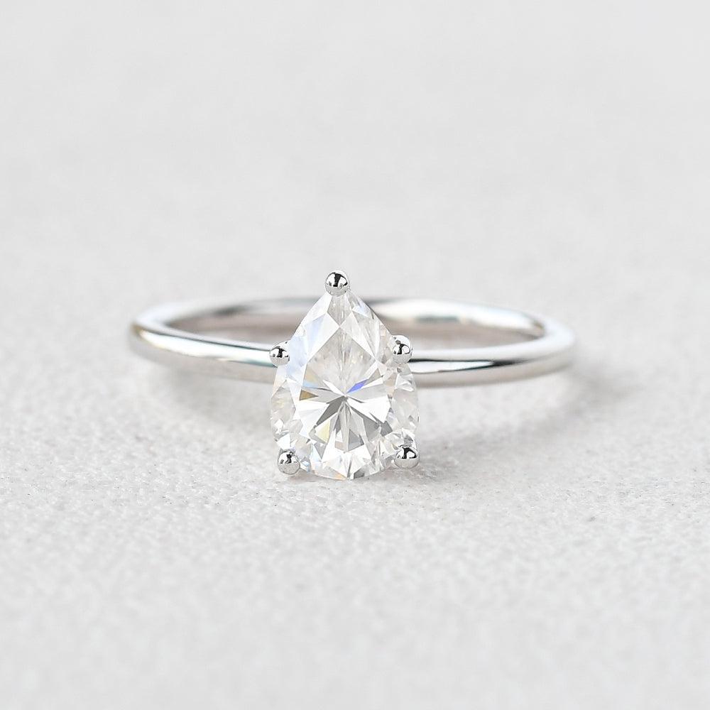 1.25 CT Pear Cut Solitaire Moissanite Engagement Ring 1