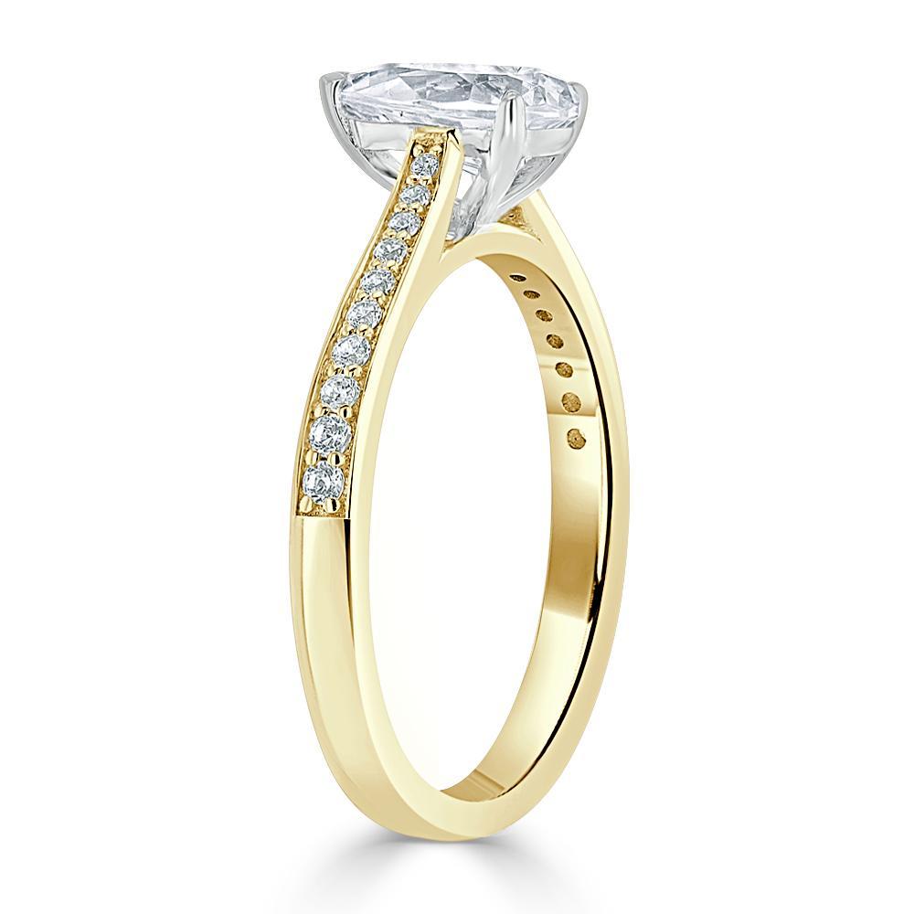 
                  
                    0.75 CT Pear Cut Solitaire Engagement Ring With Channel Pave Setting 7
                  
                