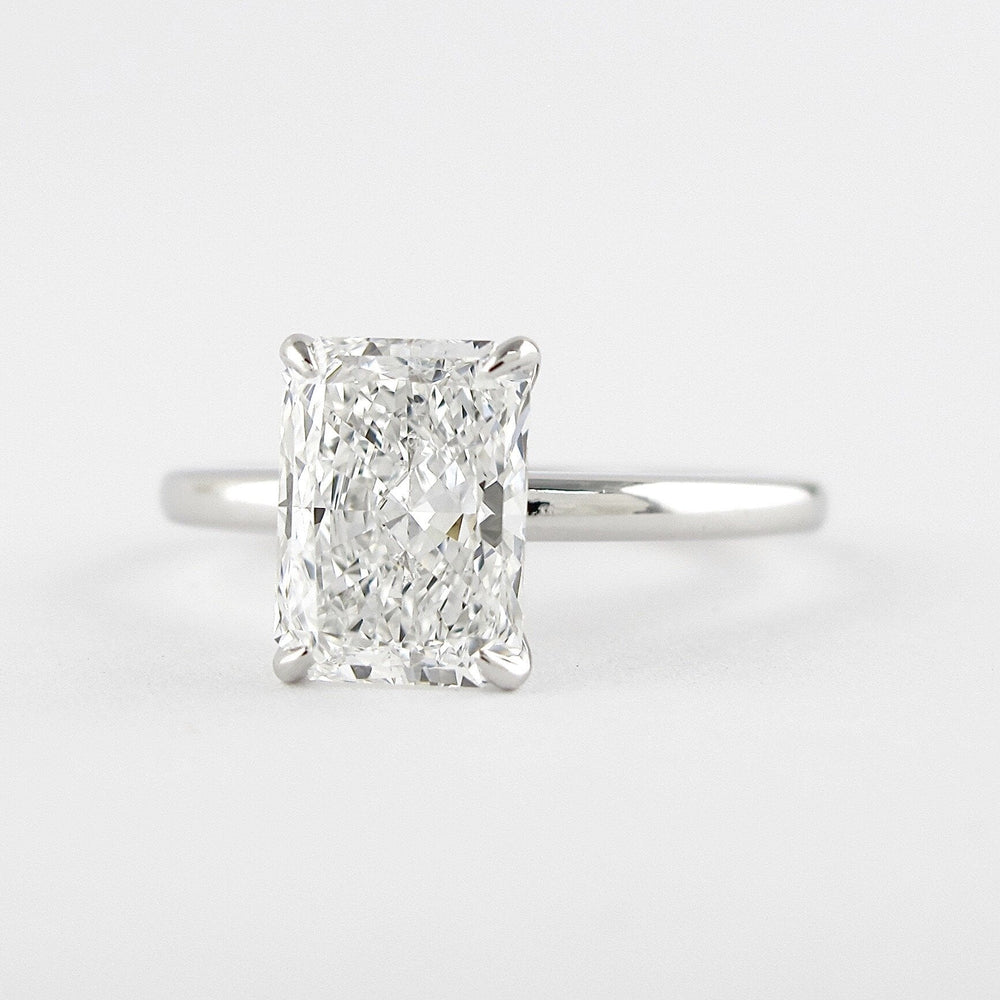 
                  
                    1.8 CT Radiant Cut Solitaire Style Moissanite Engagement Ring
                  
                