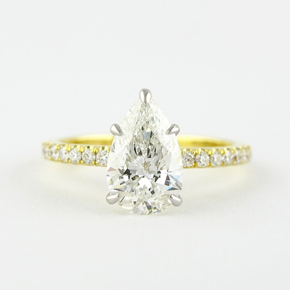 0.94 CT Pear Solitaire & Pave Setting Moissanite Engagement Ring 1