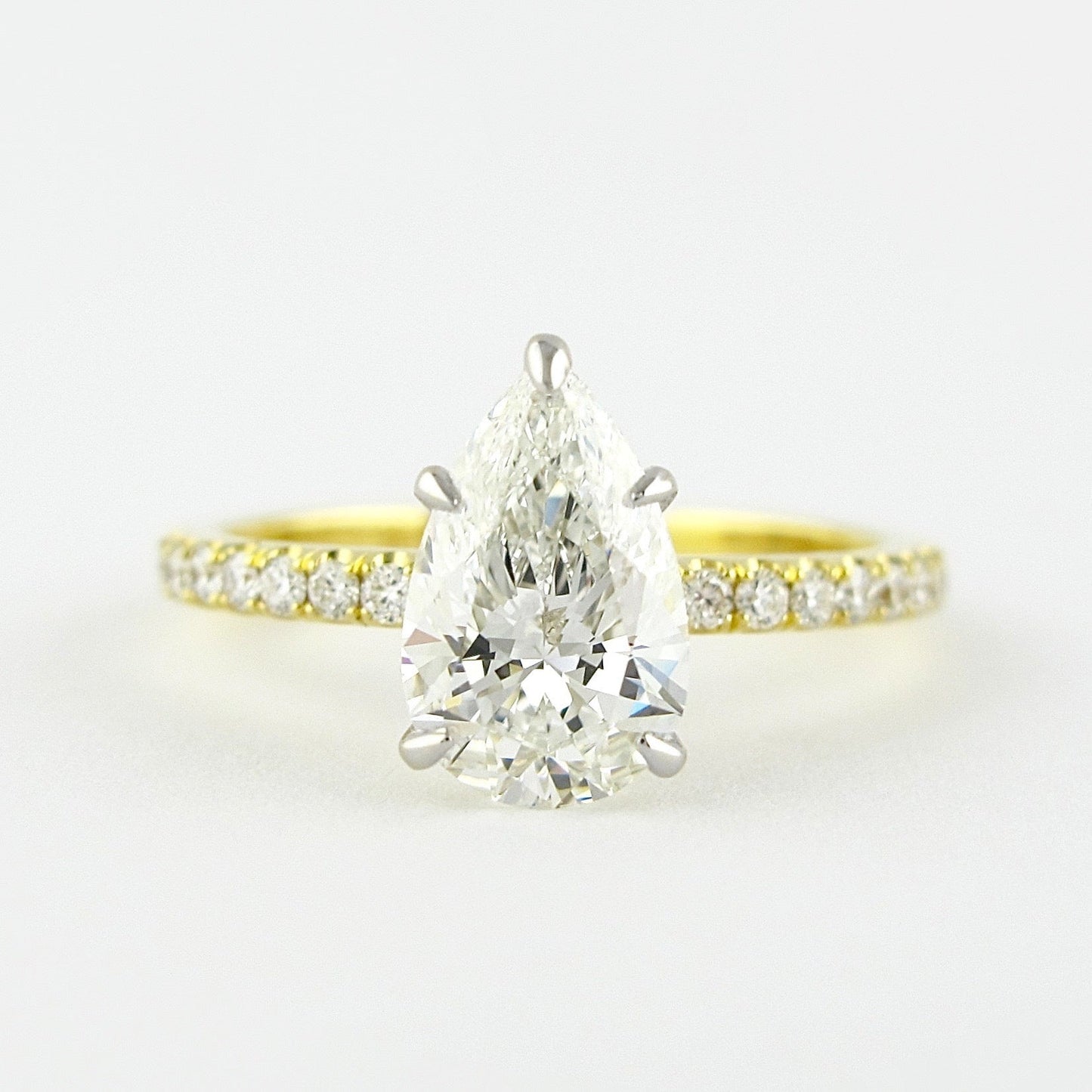 0.94 CT Pear Solitaire & Pave Setting Moissanite Engagement Ring 1