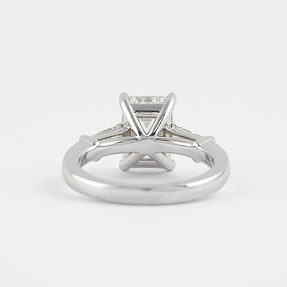 
                  
                    2.30 CT Emerald Three Stone Style Moissanite Engagement Ring
                  
                