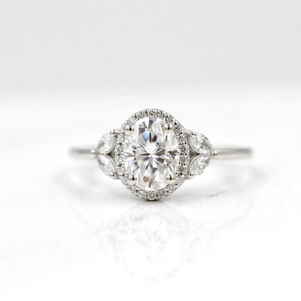 
                  
                    1.33 CT Oval Cut Halo Moissanite Engagement Ring
                  
                