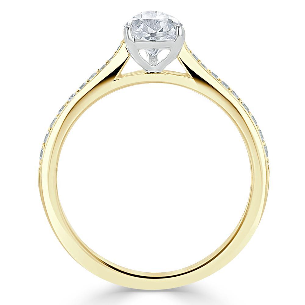 
                  
                    0.75 CT Pear Cut Solitaire Engagement Ring With Channel Pave Setting 8
                  
                