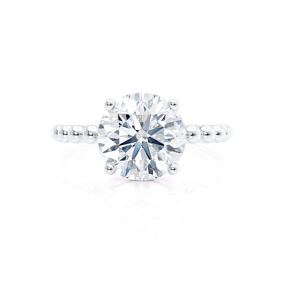 
                  
                    0.80 CT Round Shaped Moissanite Solitaire Engagement Ring 2
                  
                