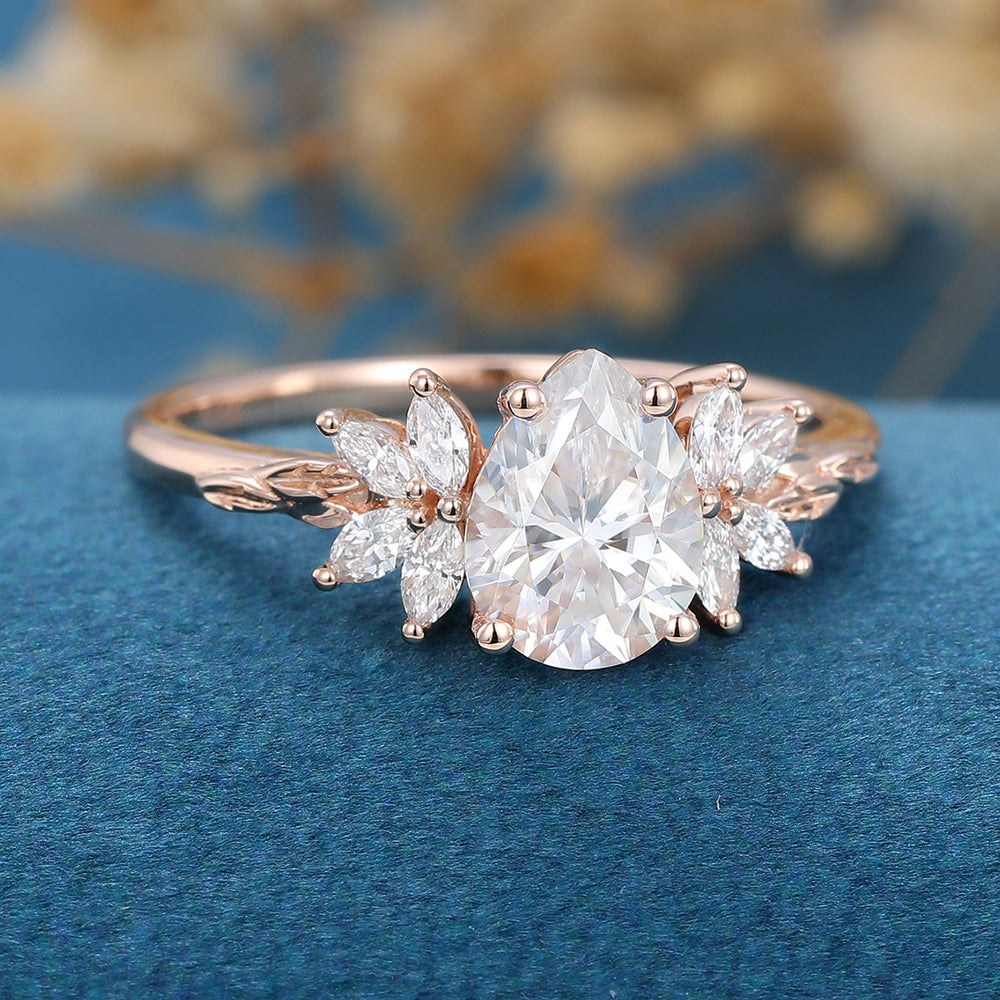 
                  
                    1.0 CT Pear Shaped Moissanite Cluster Engagement Ring
                  
                