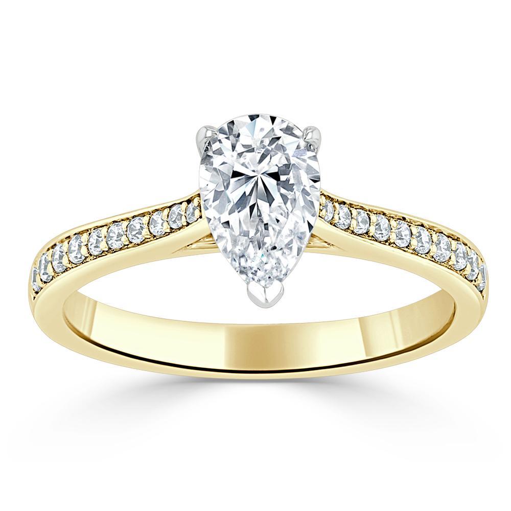 
                  
                    0.75 CT Pear Cut Solitaire Engagement Ring With Channel Pave Setting 6
                  
                