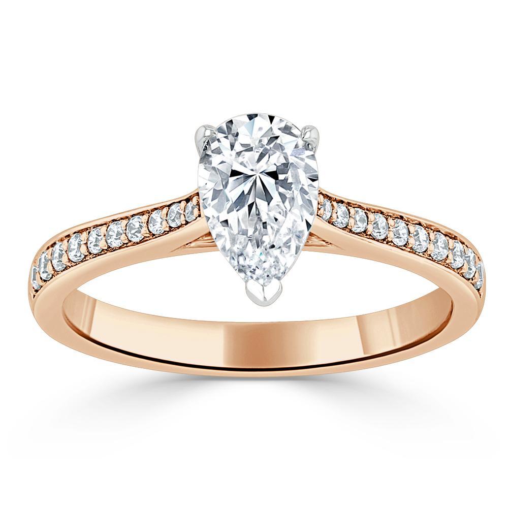 
                  
                    0.75 CT Pear Cut Solitaire Engagement Ring With Channel Pave Setting 9
                  
                