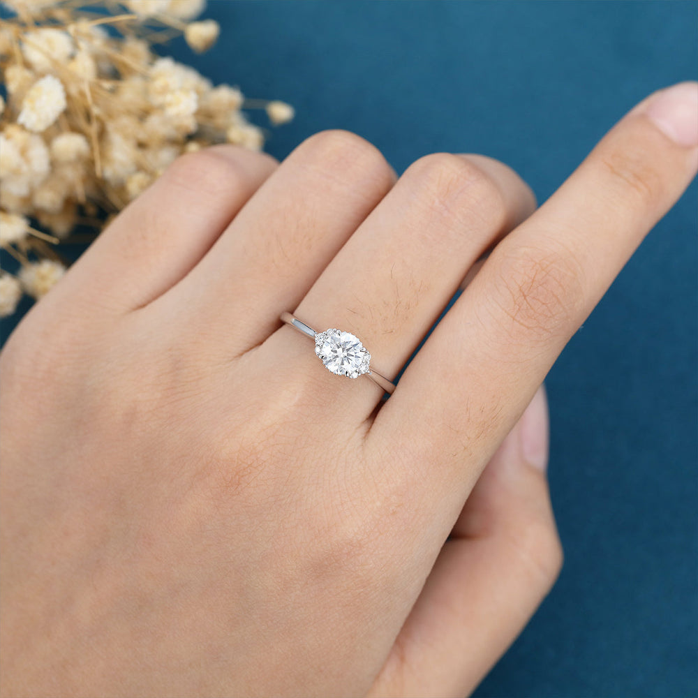 
                  
                    0.68 CT Round Shaped Moissanite Cluster Engagement Ring
                  
                