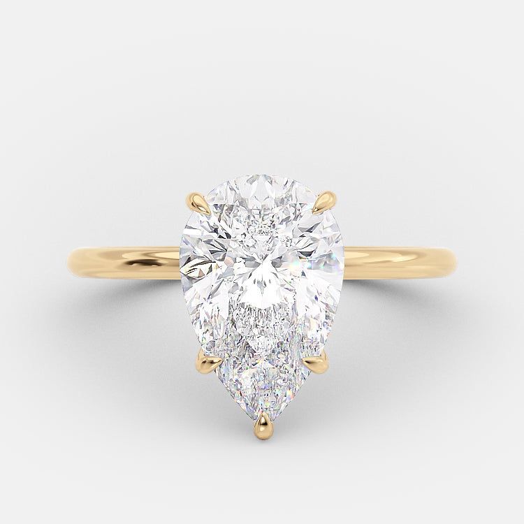 
                  
                    3.10 CT Pear Cut Solitaire Style Moissanite Engagement Ring 5
                  
                