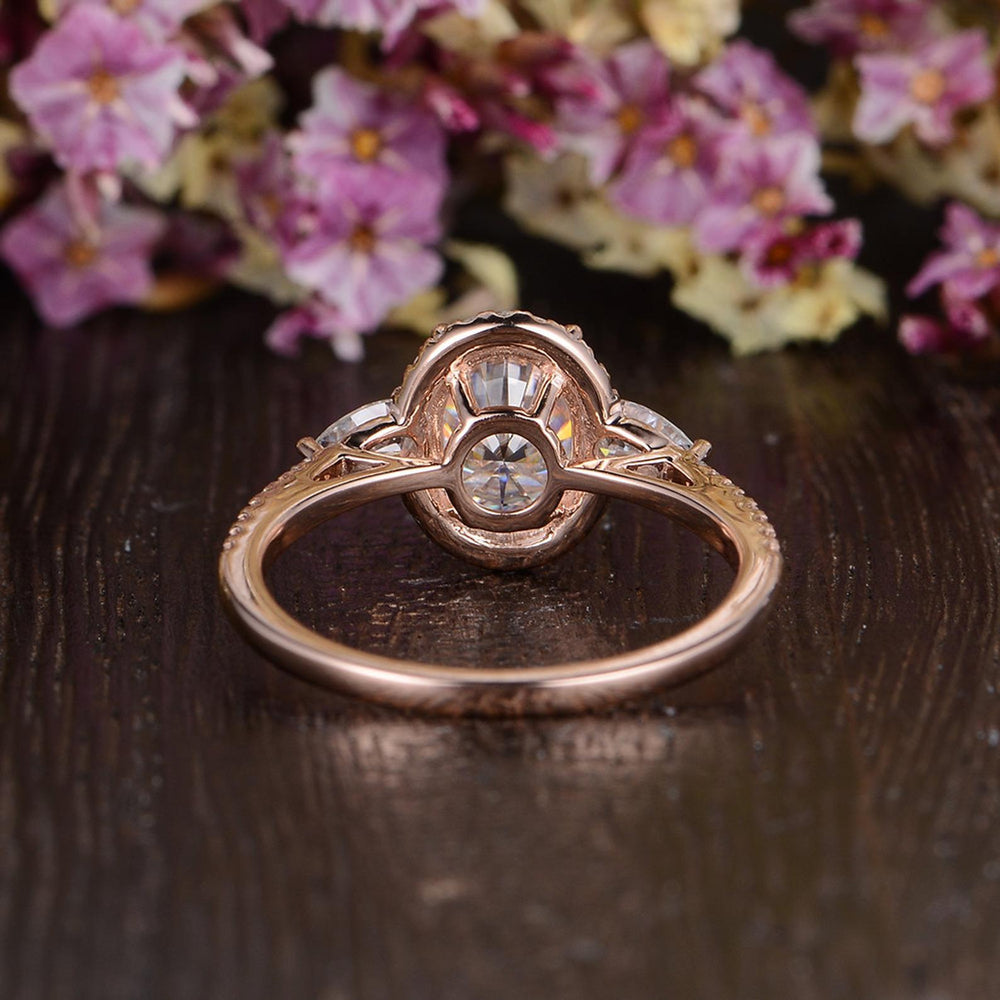 
                  
                    0.75 CT Oval Halo Three Stone Moissanite Engagement Ring 7
                  
                