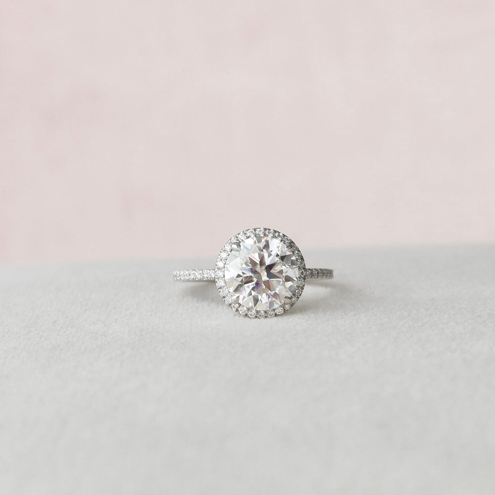 
                  
                    3.0 CT Round Cut Halo Style Moissanite Engagement Ring
                  
                