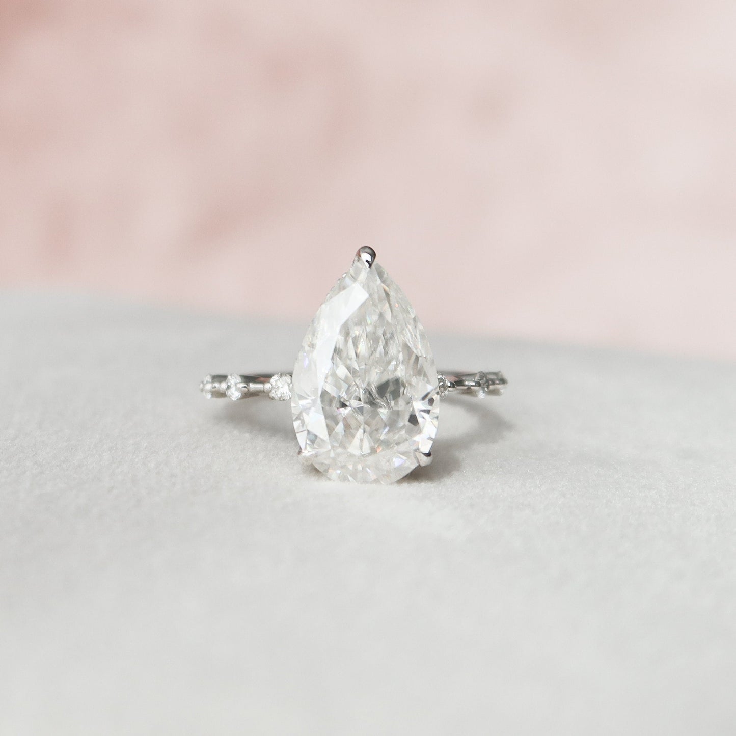 
                  
                    3.5 CT Pear Cut Dainty Pave Moissanite Engagement Ring
                  
                