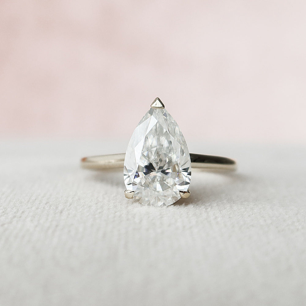 
                  
                    2.0 CT Pear Solitaire & Hidden Halo Style  Moissanite Engagement Ring
                  
                