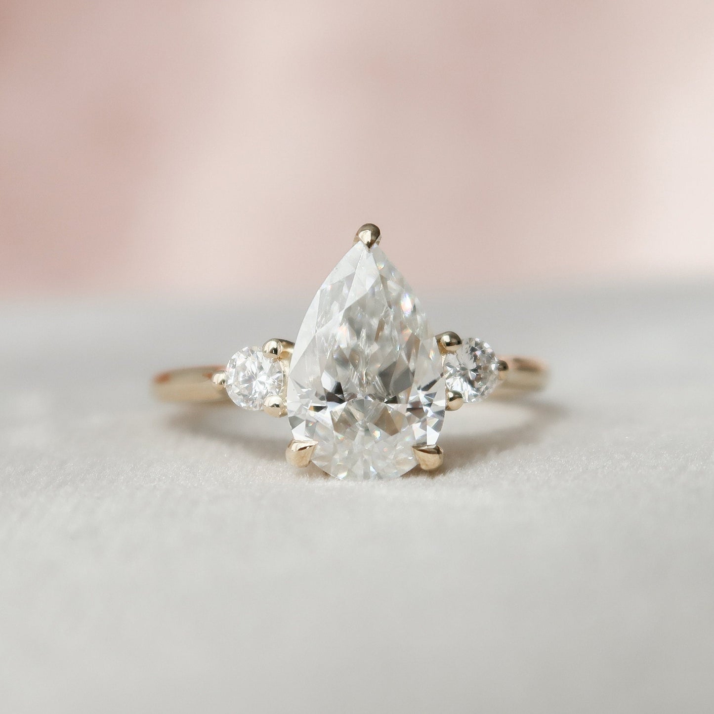 
                  
                    2.0 CT Pear Three Stone Moissanite Engagement Ring 1
                  
                