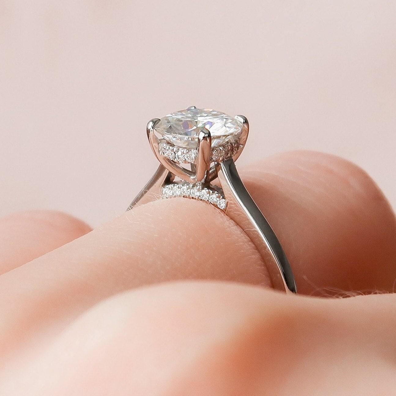 
                  
                    1.5 CT Round Hidden Halo Moissanite Engagement Ring With Diamond Bridge Setting
                  
                