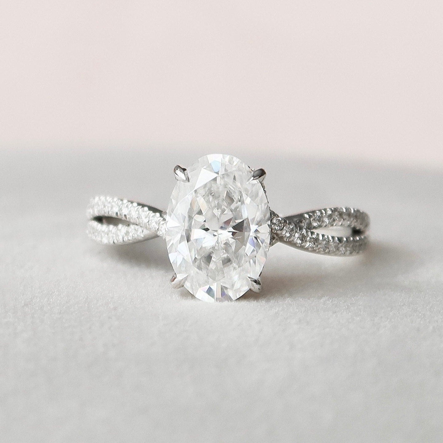 
                  
                    3.0 CT Oval Cut Solitaire & Cross Over Pave Moissanite Engagement Ring 4
                  
                