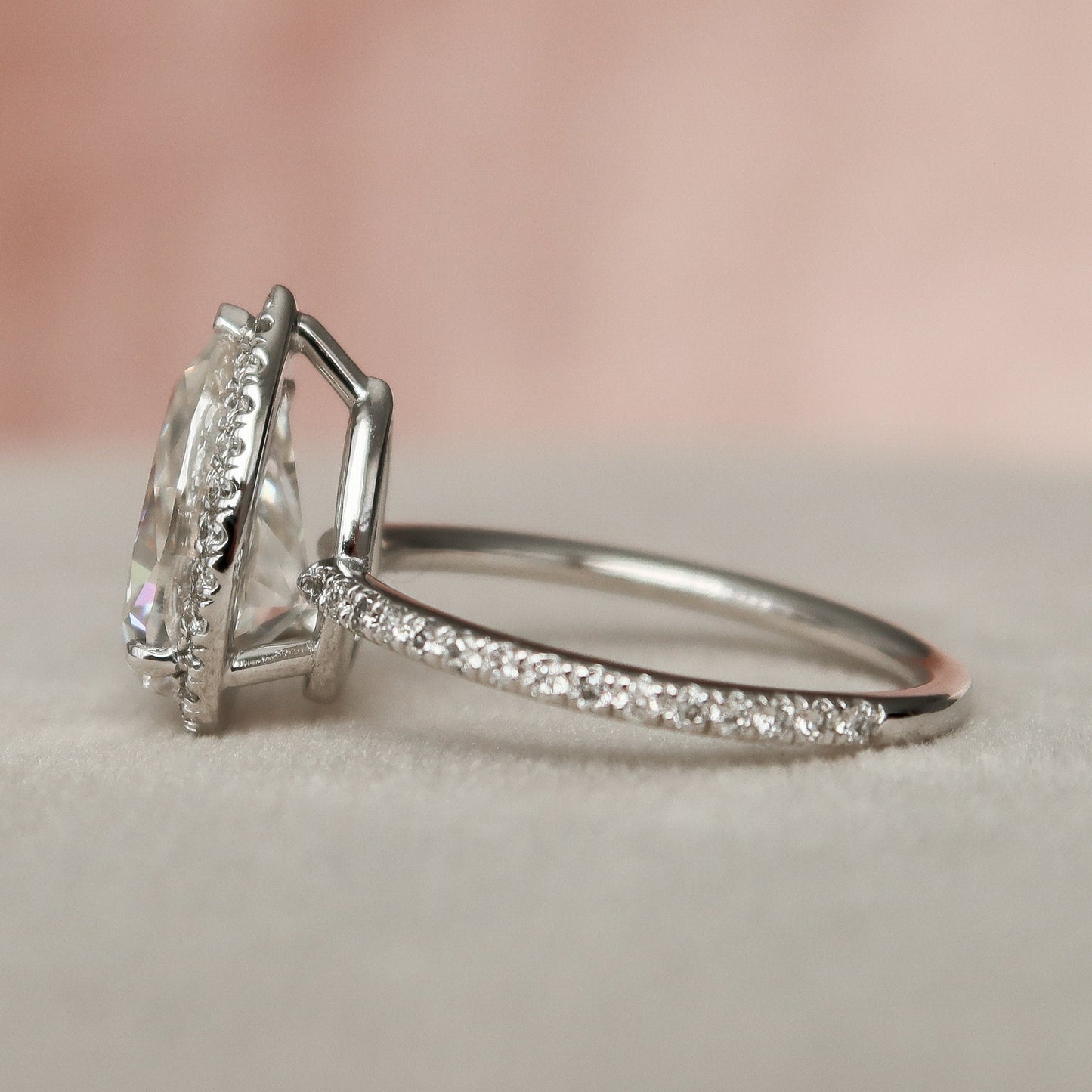 
                  
                    2.0 CT Pear Cut Halo & Pave Setting Moissanite Engagement Ring
                  
                