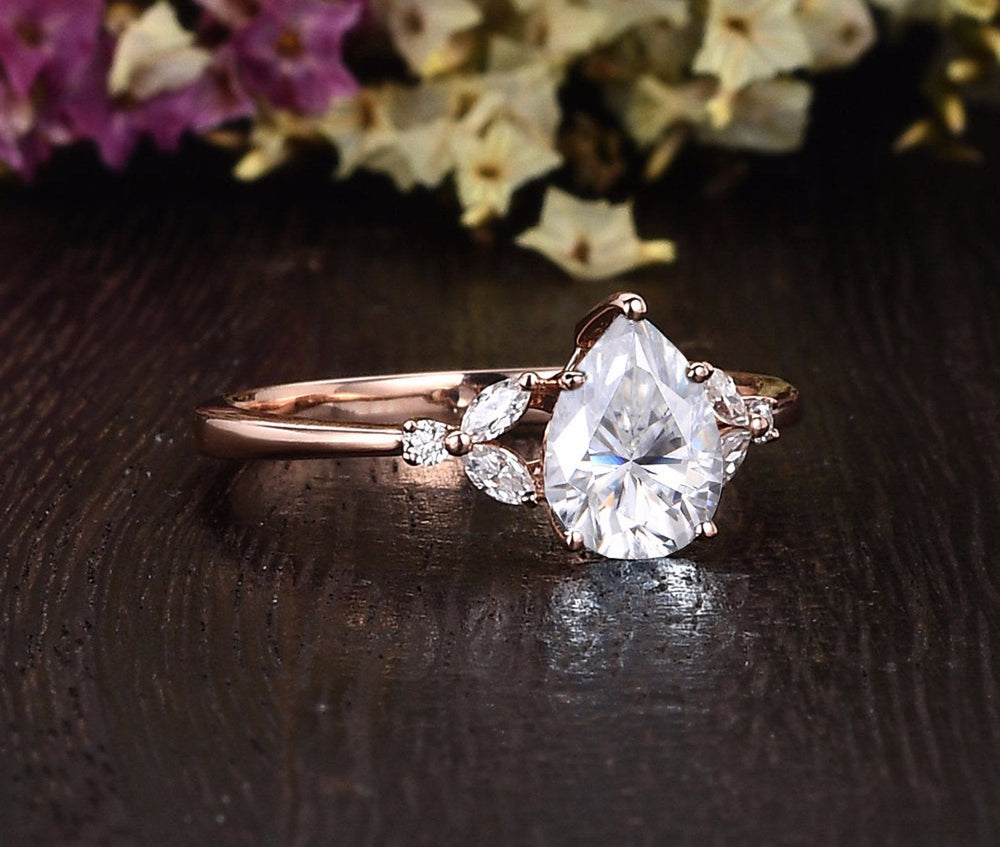 
                  
                    0.75 CT Pear Cluster Moissanite Engagement Ring 6
                  
                