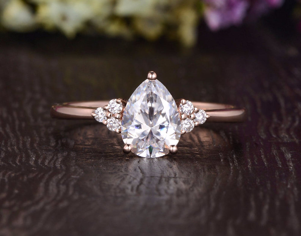 
                  
                    0.75 CT Pear Cluster Moissanite Engagement Ring 9
                  
                